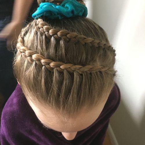Side Bun Twined Prom Hairstyles With A Braid (Photo 10 of 20)
