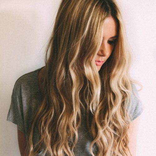 Blonde Ponytail Hairstyles With Beach Waves (Photo 14 of 20)