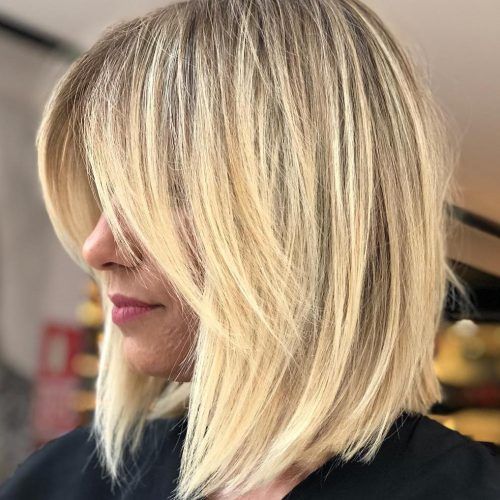Blonde Lob Hairstyles With Disconnected Jagged Layers (Photo 19 of 20)