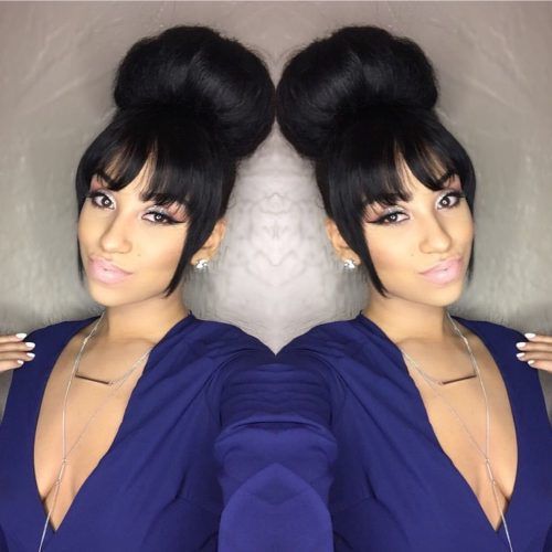 Minaj Pony Hairstyles With Arched Bangs (Photo 15 of 20)