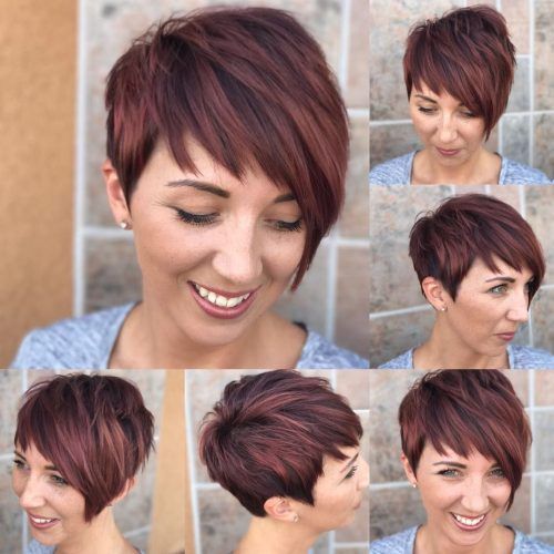 Messy Spiky Pixie Haircuts With Asymmetrical Bangs (Photo 15 of 20)