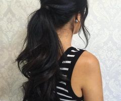 20 Best Collection of Wavy Ponytails with Flower