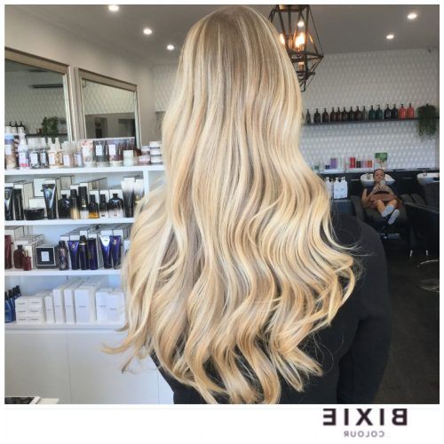 Creamy Blonde Waves With Bangs (Photo 15 of 20)