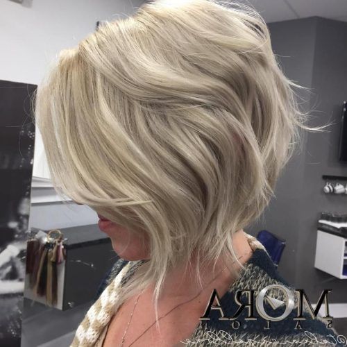 Angled Wavy Lob Blonde Hairstyles (Photo 12 of 20)