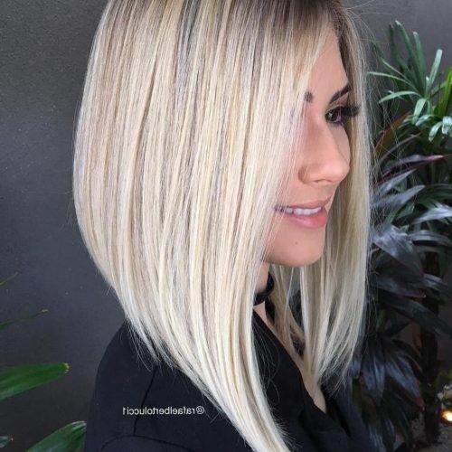 Striking Angled Platinum Lob Blonde Hairstyles (Photo 3 of 20)