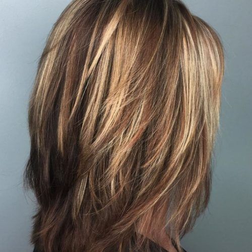 Flipped Lob Hairstyles With Swoopy Back-Swept Layers (Photo 9 of 20)