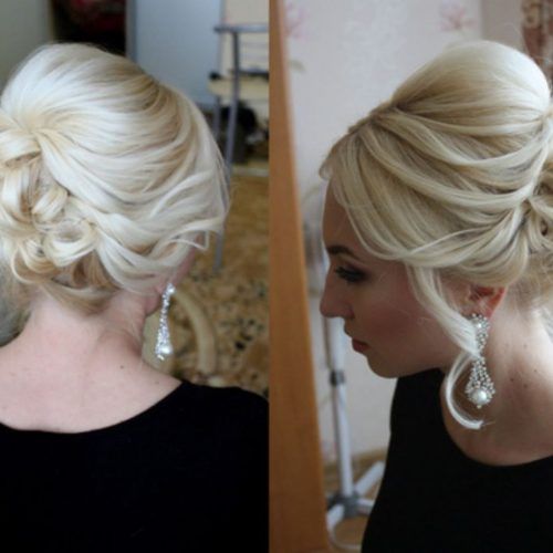 Bridal Mid-Bun Hairstyles With A Bouffant (Photo 3 of 20)