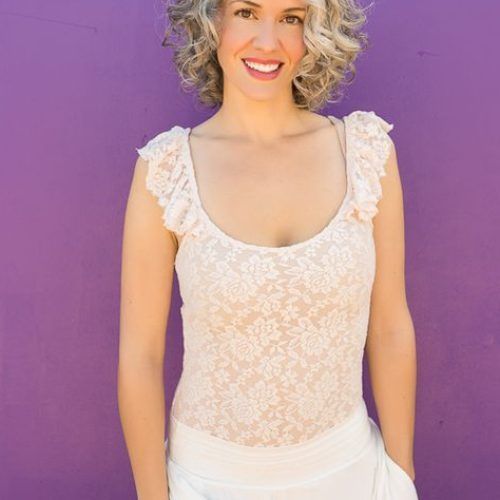 Short Loose Curls Hairstyles With Subtle Ashy Highlights (Photo 9 of 20)