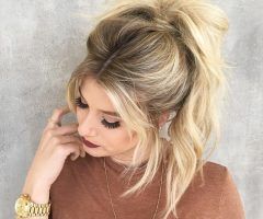 2024 Popular Messy Voluminous Ponytail Hairstyles with Textured Bangs