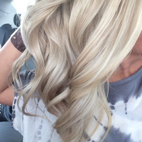 Pearl Blonde Bouncy Waves Hairstyles (Photo 15 of 20)