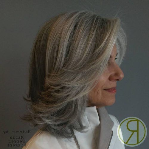 Lovely Golden Blonde Haircuts With Swoopy Layers (Photo 9 of 20)