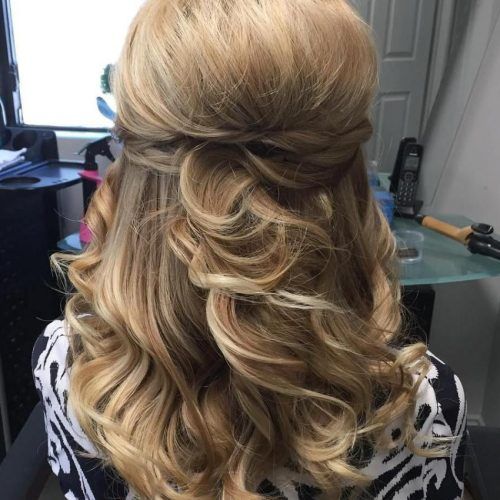 Bridal Mid-Bun Hairstyles With A Bouffant (Photo 20 of 20)