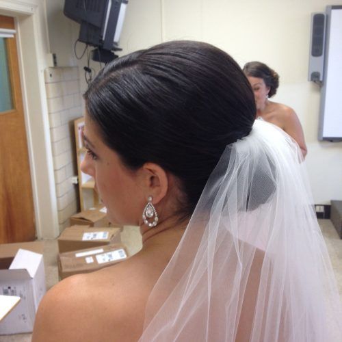 Veiled Bump Bridal Hairstyles With Waves (Photo 7 of 20)