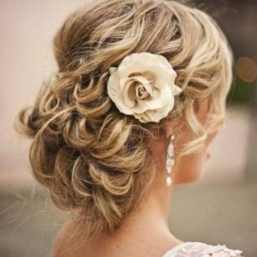 Curly Wedding Updos With Flower Barrette Ties (Photo 3 of 20)