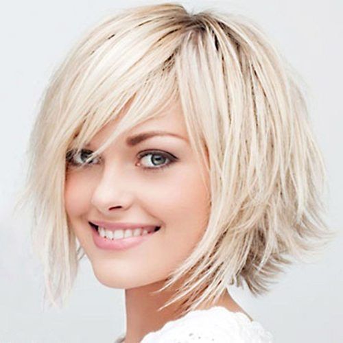 Cute Chopped Bob Hairstyles With Swoopy Bangs (Photo 10 of 20)