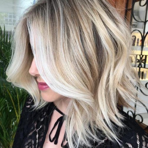 Choppy Cut Blonde Hairstyles With Bright Frame (Photo 15 of 20)