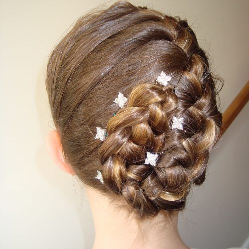 Side Bun Twined Prom Hairstyles With A Braid (Photo 4 of 20)