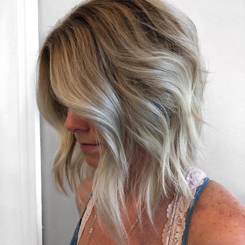 Thick Feathered Blonde Lob Hairstyles (Photo 17 of 20)