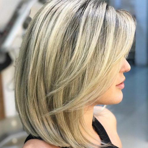 Lovely Golden Blonde Haircuts With Swoopy Layers (Photo 20 of 20)