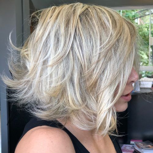 Thick Feathered Blonde Lob Hairstyles (Photo 4 of 20)
