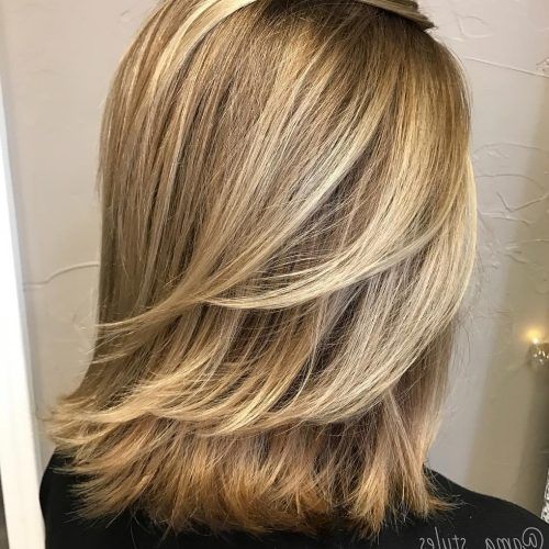 Lovely Golden Blonde Haircuts With Swoopy Layers (Photo 8 of 20)