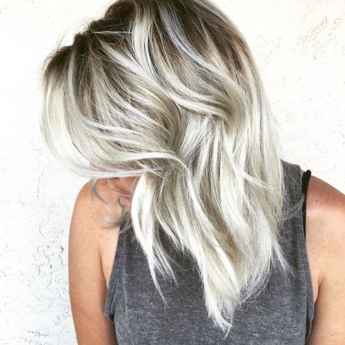 Dark Roots And Icy Cool Ends Blonde Hairstyles (Photo 4 of 20)