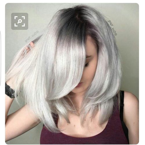 Dark Roots And Icy Cool Ends Blonde Hairstyles (Photo 5 of 20)