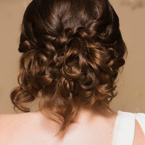Loose Updo Wedding Hairstyles With Whipped Curls (Photo 20 of 20)