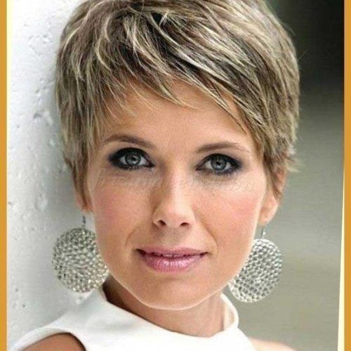 Ashy Blonde Pixie Haircuts With A Messy Touch (Photo 15 of 15)
