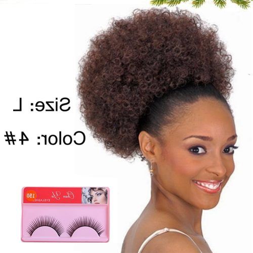 Curly Blonde Afro Puff Ponytail Hairstyles (Photo 17 of 20)