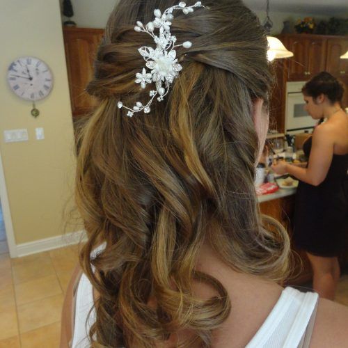 Half Up Half Down With Flower Wedding Hairstyles (Photo 1 of 15)