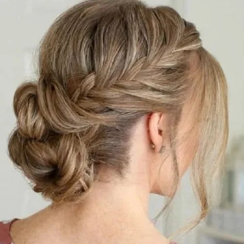 Low Braided Bun With A Side Braid (Photo 12 of 15)