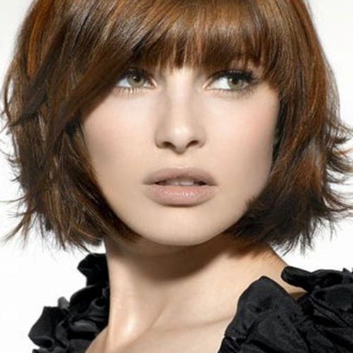 Medium Hairstyles With Perky Feathery Layers (Photo 10 of 20)