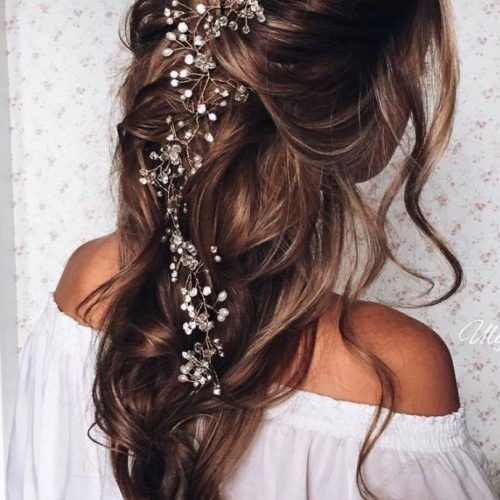 Wedding Hairstyles For Long Hair Down With Flowers (Photo 4 of 15)