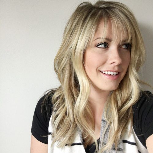 Wispy Layered Blonde Haircuts With Bangs (Photo 5 of 20)