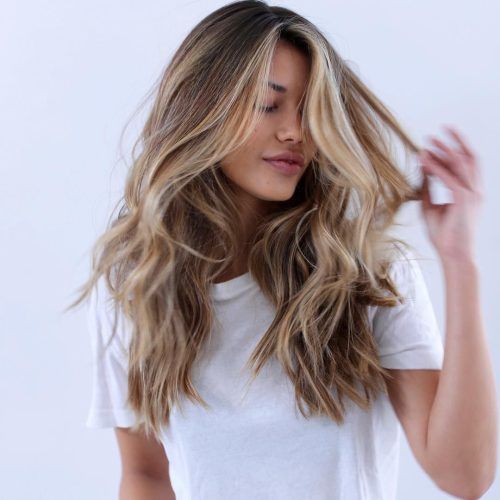 Salty Beach Blonde Layers Hairstyles (Photo 13 of 20)