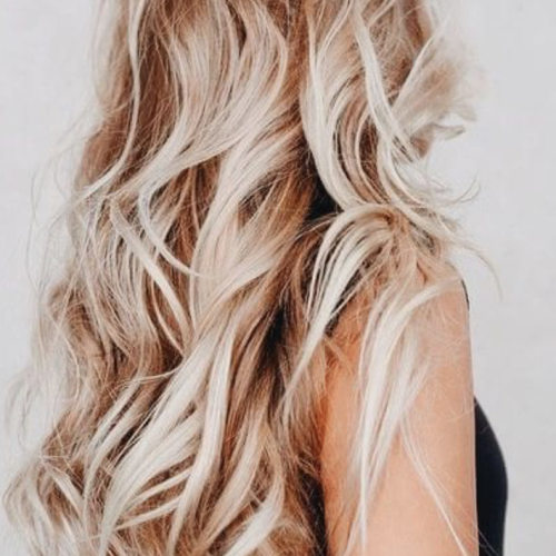 Salty Beach Blonde Layers Hairstyles (Photo 2 of 20)