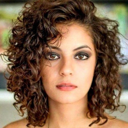Layered Curly Medium Length Hairstyles (Photo 2 of 20)