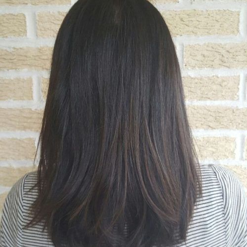 Flipped Lob Hairstyles With Swoopy Back-Swept Layers (Photo 12 of 20)