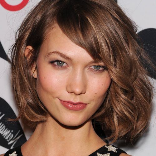 Curly Messy Bob Hairstyles With Side Bangs (Photo 11 of 20)