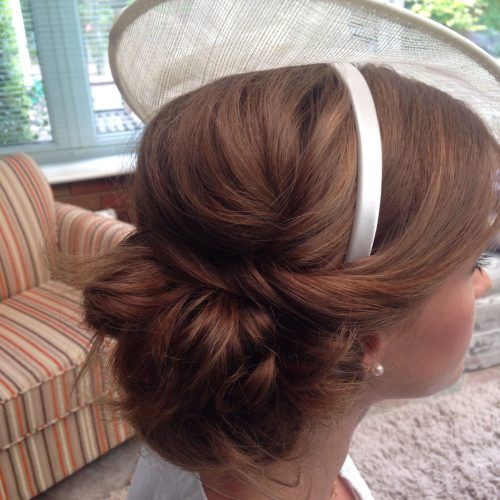 Twisted Low Bun Hairstyles For Wedding (Photo 4 of 20)