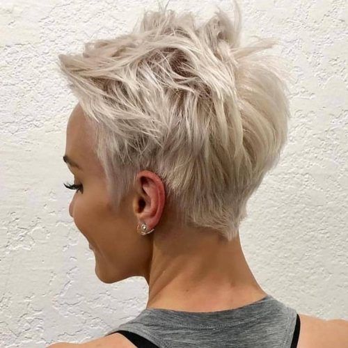 Messy Highlighted Pixie Haircuts With Long Side Bangs (Photo 17 of 20)