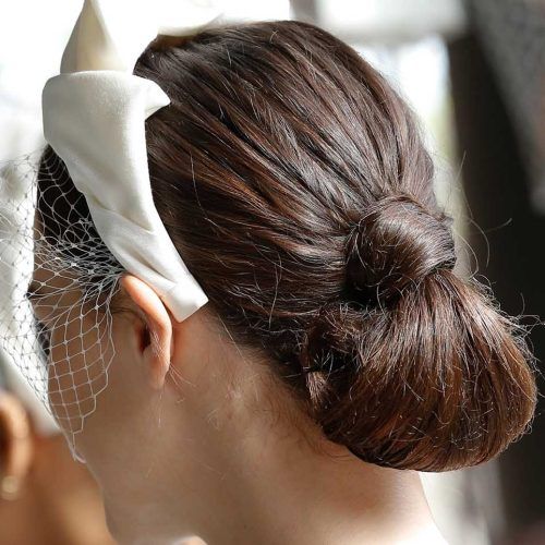 Accessorized Undone Waves Bridal Hairstyles (Photo 20 of 20)