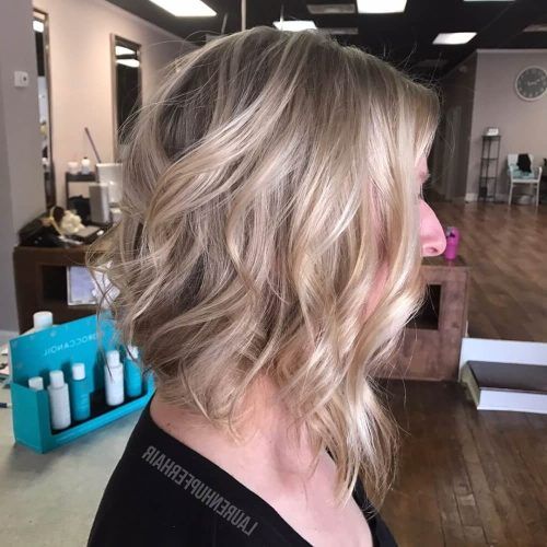 Angled Wavy Lob Blonde Hairstyles (Photo 17 of 20)