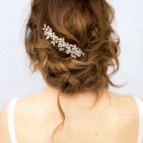 Curly Wedding Updos With Flower Barrette Ties (Photo 14 of 20)