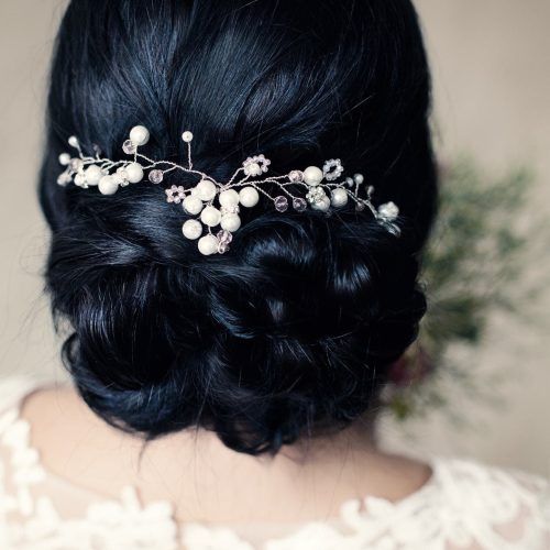 Delicate Curly Updo Hairstyles For Wedding (Photo 20 of 20)