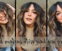 15 Photos Loose Waves with Unshowy Curtain Bangs