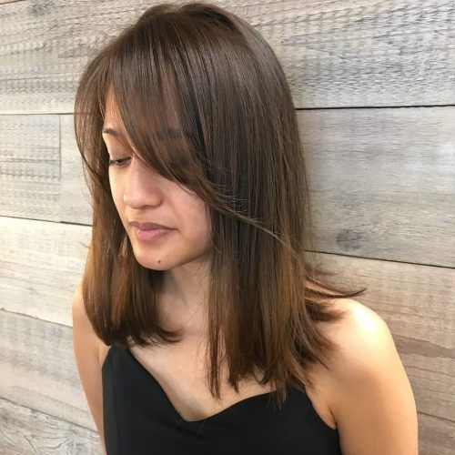 Medium Haircuts With Layers And Side Swept Bangs (Photo 10 of 20)