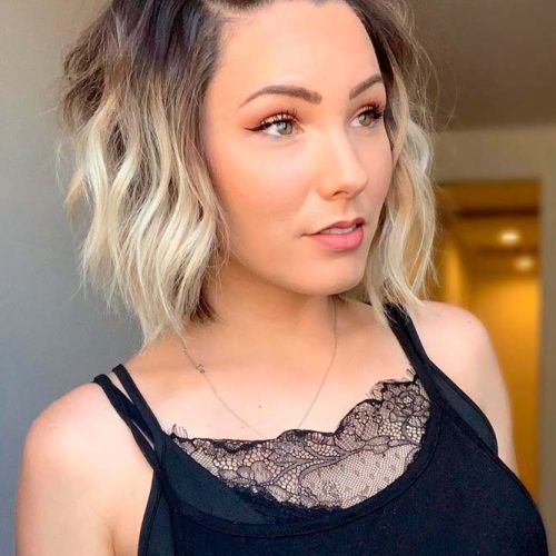 Medium Length Wavy Hairstyles With Top Knot (Photo 9 of 20)