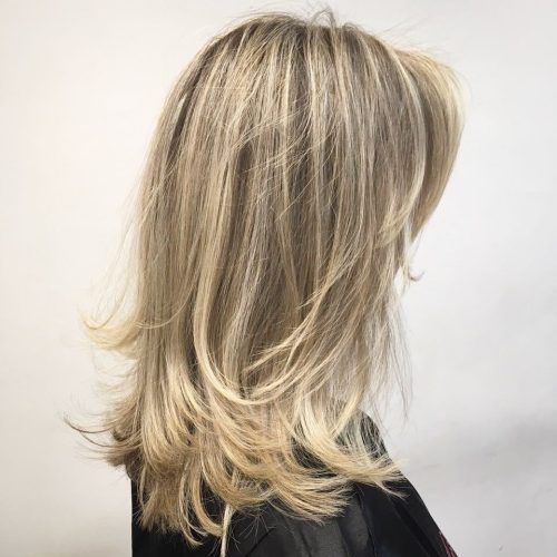 Thick Feathered Blonde Lob Hairstyles (Photo 14 of 20)